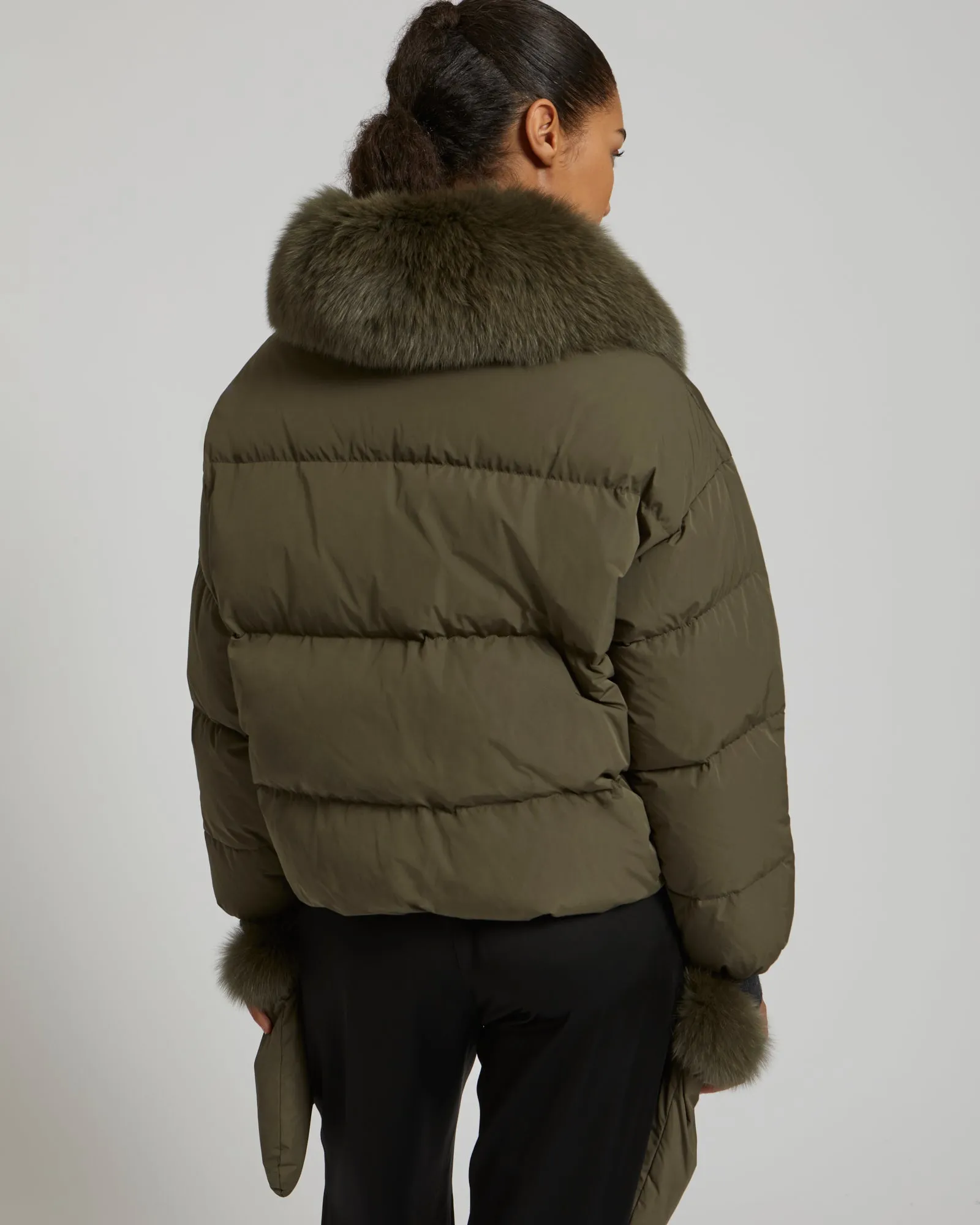 Boxy down jacket in waterproof technical fabric with fox fur collar