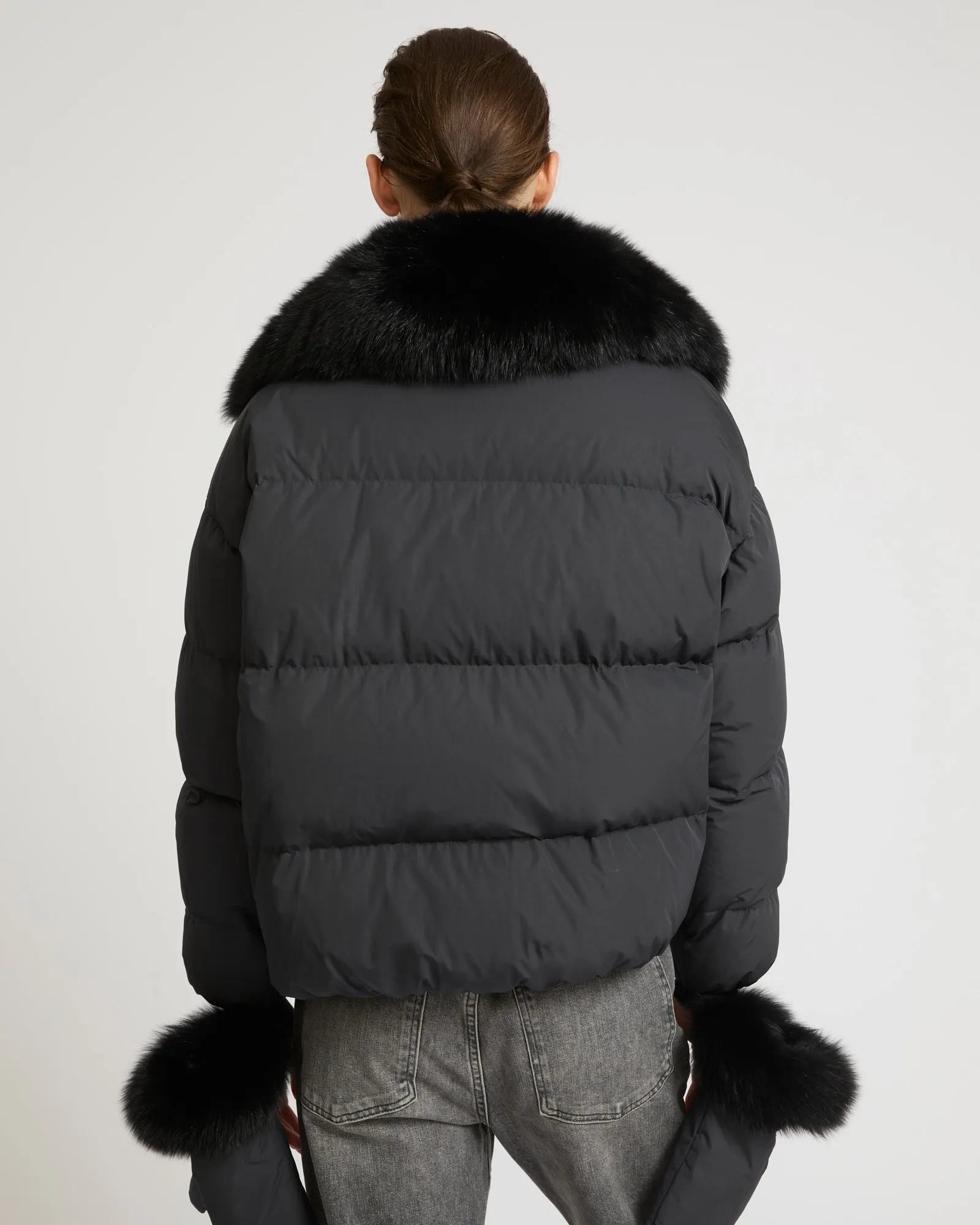 Boxy down jacket in waterproof technical fabric with fox fur collar