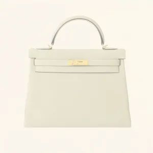 Hermès | Trench Togo Retourne Kelly - Gold Hardware | 32
