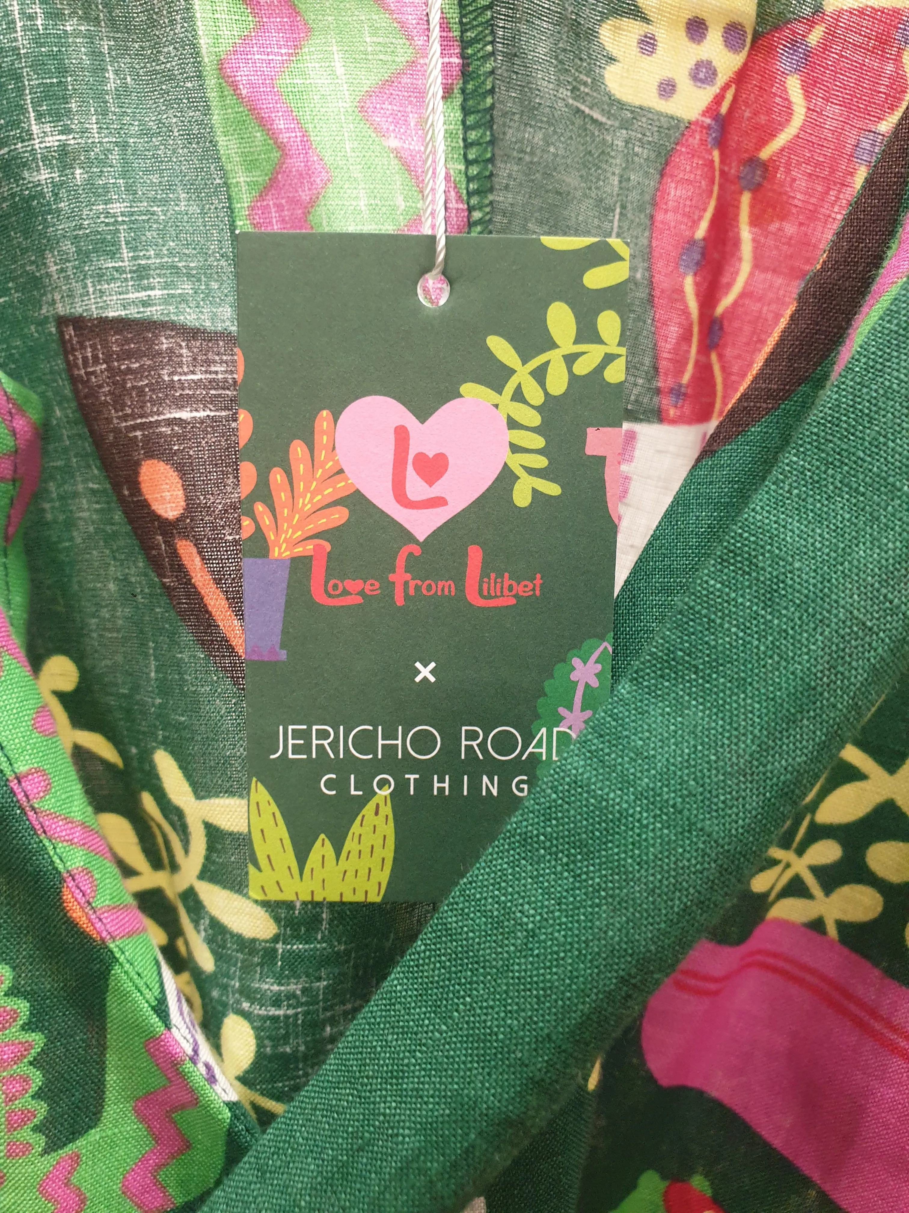 Jericho Road cropped green "crazy cactus" print wrap top size 8
