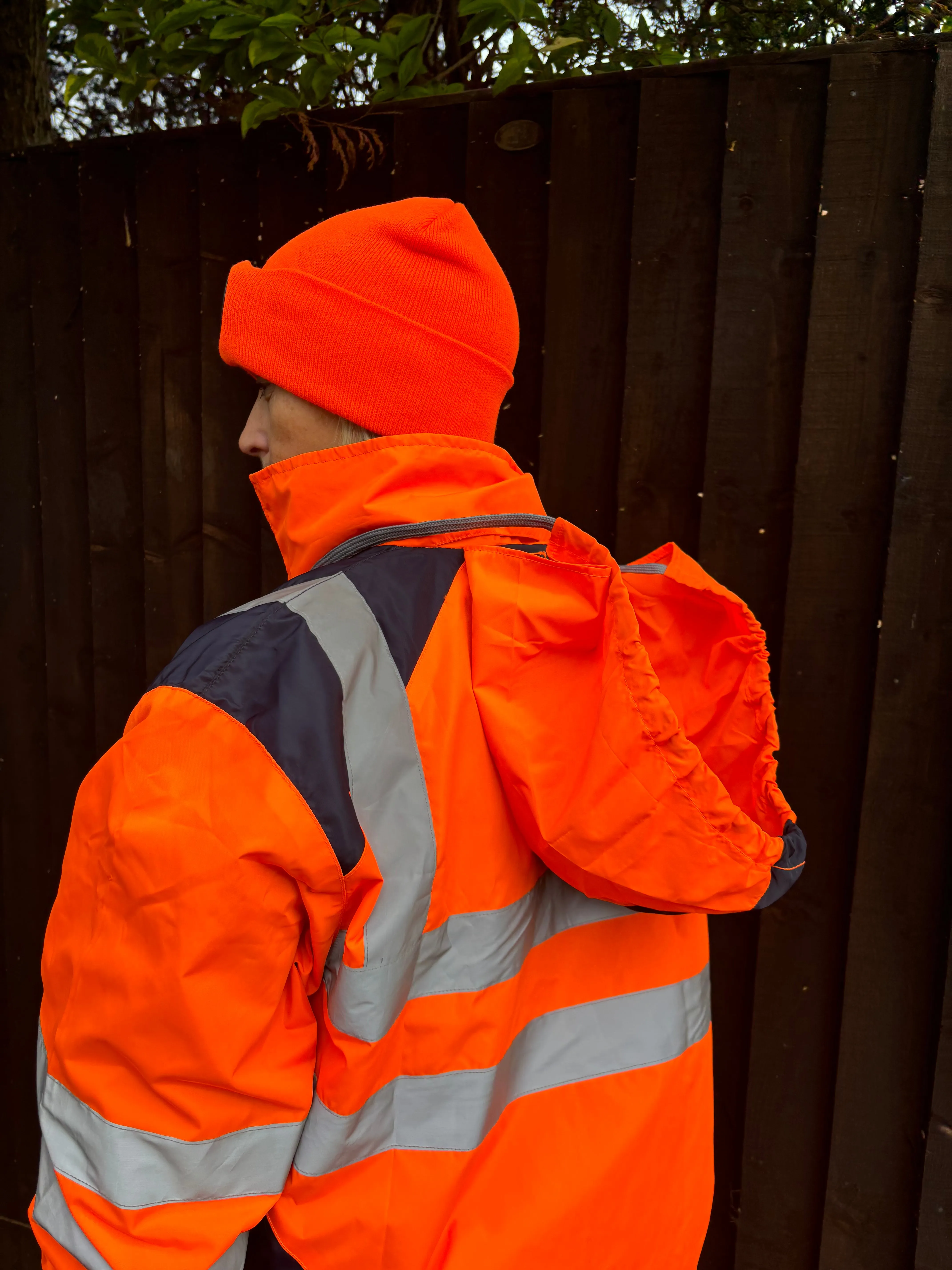 New orange long hi vis thin waterproof coat with pack away hood 🤍