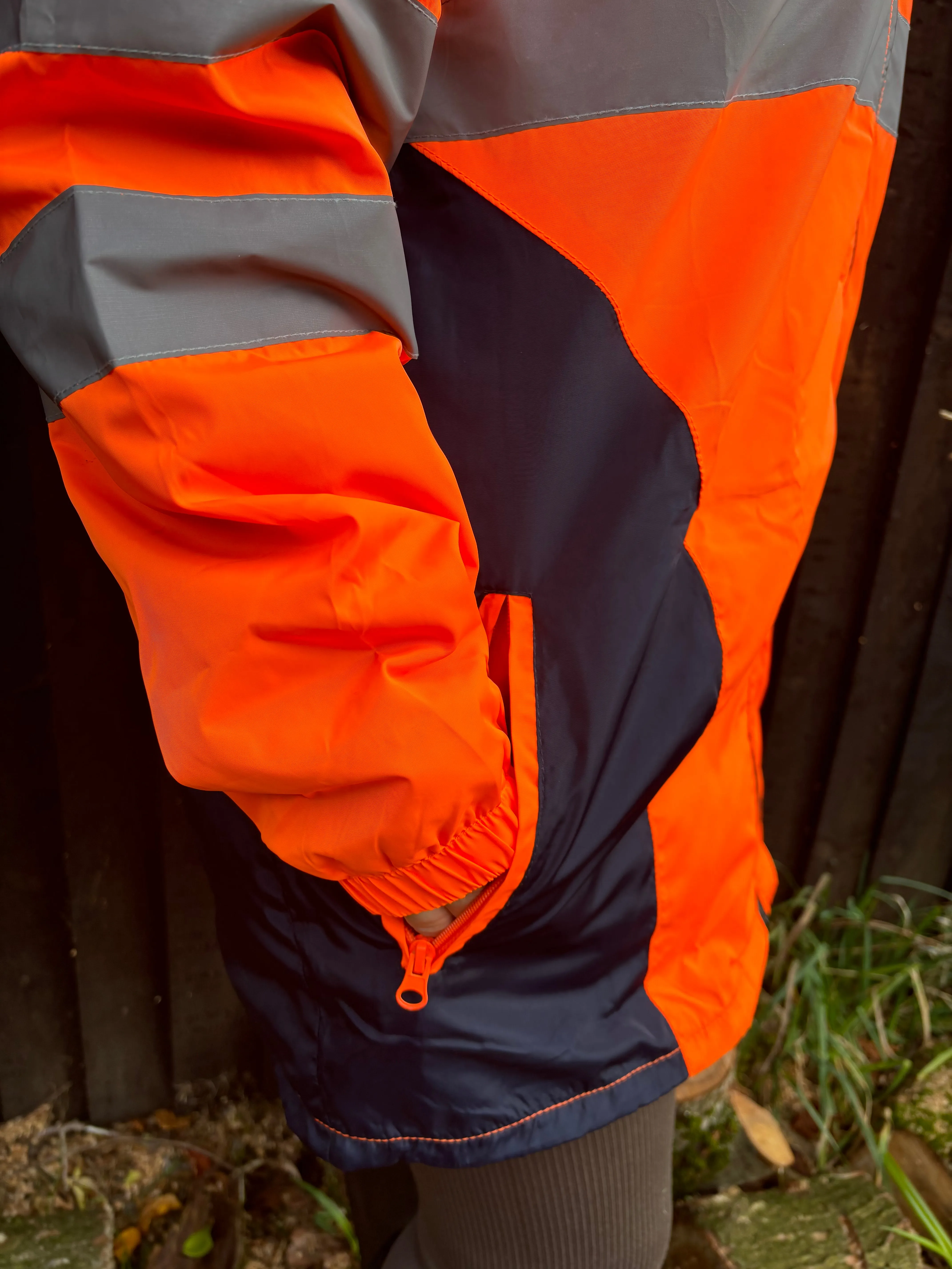 New orange long hi vis thin waterproof coat with pack away hood 🤍
