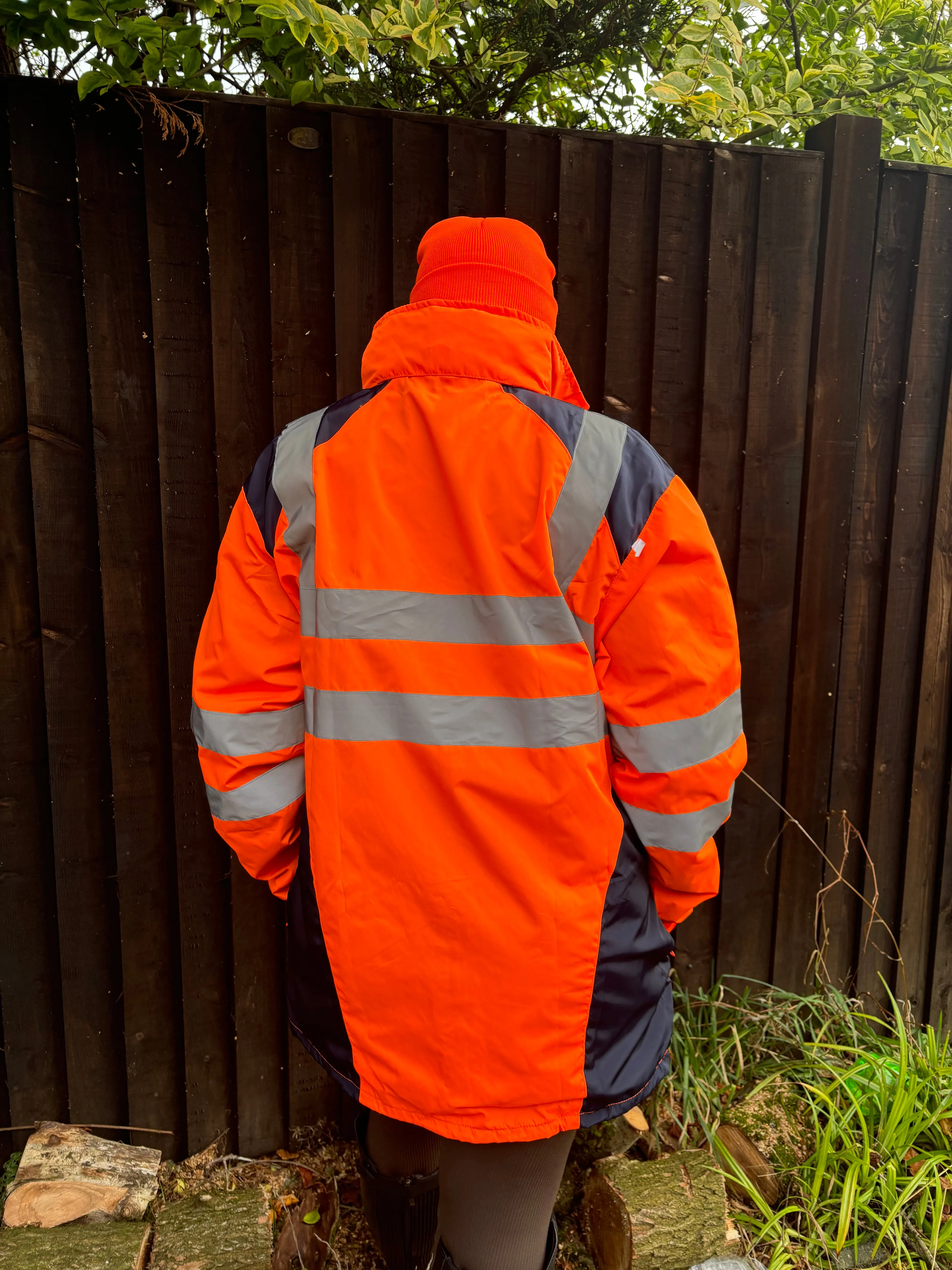 New orange long hi vis thin waterproof coat with pack away hood 🤍